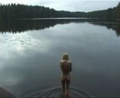 Elina Brotherus 2001/2003.nPart 3 of a video triptych, DVD loops, 13 min 56 sec each, DV PAL 4:3, silent.nnThe Baigneurs video installation portrays nude swimmers in Finnish nature. The form is cyclic, repetitive: a swimmer plunges into water and returns, waves hit the shore; only the places and figures change. The bodies are simultaneously beautiful and banal. nBaigneurs examines beauty through the (National) Romanticist landscape and the classical bather motif. The water plays as important a r