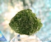 Item Code: IM056 nMetric Dimensions: 35 x 26 x 11 mm nImperial Dimensions: 1 3/8” x 1” x 7/16” nWeight: 51.6 Carats (10.33 grams) nnThis Investor Grade Moldavite™ has incredibly bright green transparency and deep varied etching. Its overall shape is egg-like, something we have seen very little of in over fifteen years dealing with this mystical gem. At 10+ grams, this lusciously-textured Tektite is over twice the size of average Moldavite specimens. All these factors add up to a stun