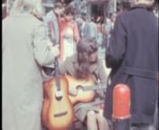 Archival footage shot by an amateur filmmaker while visiting Holland, probably in 1968nnIt contains stock footage of Amsterdam: people walking in the street under the Munttoren (Mint Tower), pedestrians waiting at the tram stop, traffic around Dam Square, a teenager orchestra playing in the street, sightseeing boats approaching the pier in a canal, and more.nnPlease, comment if you recognize more subjects. nnIf you want to watch this video without the watermark and advertising, please visit: nht
