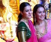 Cousins and Kuch Kuch Hota Hai co stars Kajol and Rani Mukerji twin in pink sarees. Kajol and Rani Mukerji are second cousins to each other as we all know. The sisters always come together to celebrate Durga Pooja. In this throwback video we can see both the divas dressed in pink sarees. Their family Durga Puja is organised by filmmaker Ayan Mukerji&#39;s father Deb Mukherjee and his cousin Sharbani Mukherjee. Rani opted for a lighter shade and teamed it up with a golden coloured blouse. Her hair wa
