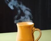 A Video Of Steam Rising From A Fresh Roasted Coffee &amp; Espresso Cup