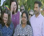 A Tamil family seeking asylum has touched down in the central Queensland town where they used to live after more than four years in detention. The Nadesalingam family were living in Biloela when their bridging visas expired in 2018 and they were taken into immigration detention.