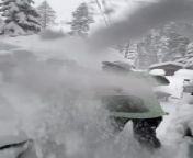 In snow-covered Truckee, California, a woman was about to leave in her car when someone asked her if she would clear the snow that was piled all over it. She sarcastically took out a broom from the car and removed a small chunk of snow, just enough to see the road.
