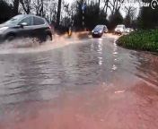 Drivers battle deep flood water along Walsall Road, near Walsall Wood, during heavy rain.