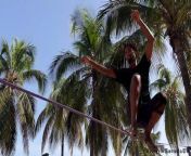 The sport of slackline balancing is becoming increasingly popular with young people in Tarrafal, on the island of Santiago in Cape Verde. Denis Tavares began slacklining after quitting drugs, and now hopes to compete internationally.