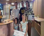Potential Newcastle Liberal candidate Thomas Triebsees and MP Natasha Maclaren-Jones help his daughter, Katarina, and her friend Ellie Goon hand over a donation to Soul Hub