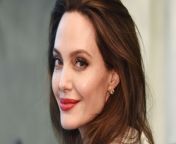 Angelina Jolie turned heads recently when she debuted her brand new look while visiting New York City. But now, some are wondering if the Oscar winner&#39;s big change is a reaction to her ex-husband&#39;s girlfriend.