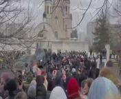 Navalny supporters chant outside funeral service in Moscow