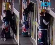 The 72-year-old Welsh shop cleaner had to be rescued by the owner when her jacket was caught on the shutters, hoisting her into the air.