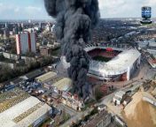 Firefighters have scrambled to put out a fire near Southampton&#39;s Football Club. Plumes of smoke could be seen miles away after the inferno broke out at a disused warehouse perilously close to St Mary&#39;s Stadium.&#60;br/&#62;&#60;br/&#62;Emergency services have put a cordon in place as eyewitnesses described hearing &#39;pops&#39; coming from the site - with smoke seen as far away as the Isle of Wight.&#60;br/&#62;&#60;br/&#62;Preston North End is due to play Southampton tonight in a crucial promotion-chasing game at the stadium at it&#39;s7.45 pm.&#60;br/&#62;&#60;br/&#62;The Saints are desperate to win after falling eight points off the top two spots for automatic promotion back to the Premier League.&#60;br/&#62;&#60;br/&#62;One eyewitness who recorded the fire and smoke joked: &#39;Don&#39;t worry all you Portsmouth fans, it&#39;s not Southampton stadium on fire!&#39;&#60;br/&#62;&#60;br/&#62;The fire is in the former Greenhams building on the Central Industrial Estate on Marine Parade.&#60;br/&#62;&#60;br/&#62;It backs loudspeaker the park at the rear of the Chapel Stand in the stadium - with 18 fire engines currently in attendance.&#60;br/&#62;&#60;br/&#62;Firefighters are on the scene, desperately working to extinguish the flames as warehouse personnel remove stacks of pallets from near the fire - with forklift trucks being used to move them away.&#60;br/&#62;&#60;br/&#62;The walls of the warehouse building were seen beginning to fall apart as it was ripped apart by the fire. The roof has collapsed and all the windows were blown out.&#60;br/&#62;&#60;br/&#62;Questions remain over whether tonight&#39;s match will go ahead - with some away fans already en route. &#60;br/&#62;&#60;br/&#62;The BBC reported that a loudspeaker had been heard telling people in the stadium to evacuate, with crowds of staff filing outside.&#60;br/&#62;&#60;br/&#62;The Hampshire and Isle of Wight Fire and Rescue Service said: &#39;Crews are currently attending a fire in Marine Parade Southampton. The initial call came in at 13:05.&#60;br/&#62;&#60;br/&#62;&#39;Additional fire engines are now heading to the scene to make it up to 18. The fire currently involves four industrial units.&#60;br/&#62;&#60;br/&#62;&#39;There is lots of smoke and people in the area are reminded to keep doors and windows closed.&#39;&#60;br/&#62;&#60;br/&#62;&#39;Some roads local to the incident are closed and people are advised to avoid the area to allow movements of emergency vehicles.&#39;&#60;br/&#62;&#60;br/&#62;Local bus services are being affected as the roads are blocked by emergency services.&#60;br/&#62;&#60;br/&#62;The Daily Echo spoke to Nikki Delaney, who was in the area when the factory went up in flames.&#60;br/&#62;&#60;br/&#62;She said: &#39;The flames are high and it&#39;s getting worse.&#60;br/&#62;&#60;br/&#62;&#39;The heat from the flames is a lot and I&#39;m not even close.&#39;&#60;br/&#62;&#60;br/&#62;Children have been evacuated from a primary school due to the fire and smoke.&#60;br/&#62;&#60;br/&#62;Pupils at St Mary&#39;s Primary were removed from the school after a build-up of smoke over the playground.&#60;br/&#62;&#60;br/&#62;They were taken to St Johns Primary and Nursery School on French Street around the build-up and 1:45 p.m. and parents were being asked to pick up their children.