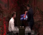 Jimmy and Chris Hemsworth face off in a twist on the card game War where the loser of each hand faces wet consequences.