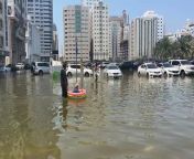 Sharjah residents use inflatables to wade through the water from water polo women