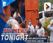Residents of Carmen and Lanuza in Surigao Del Sur receive food packs, cash aid &#60;br/&#62;