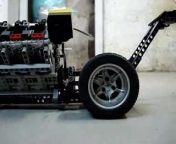 Description: A working Lego V6 dragster! Dig the small bits of rubber accumulating behind the wheels!
