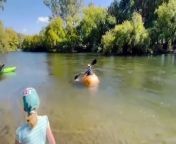 Pumpkin boat takes to Tumut River from river fishing for big fish in giant swirl pool