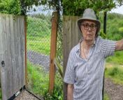 A bemused OAP found his garden gate blocked by a chain-link fence in a bizarre row over a 90cm strip of land owned by his neighbour.&#60;br/&#62;&#60;br/&#62;David Breeze, 80, believes the barrier was built following a dispute over him crossing a small strip of land to reach a public footpath when leaving his back garden.&#60;br/&#62;&#60;br/&#62;Mr Breeze has regularly used the gate at the property in Reedham, Norfolk for the last 23 years.&#60;br/&#62;&#60;br/&#62;He said he had made attempts to contact the landowner, Chris Mutten, to ensure he was not trespassing.&#60;br/&#62;&#60;br/&#62;He uses the footpath, which runs east from Yareview Close to Cliff Close, to walk to the doctors surgery and post office as it cuts across a field connecting two halves of the village.&#60;br/&#62;&#60;br/&#62;The row comes as angry villagers have objected to a controversial plan to build 27 new homes in the field owned by Mr Mutten, who is also a parish councillor.&#60;br/&#62;&#60;br/&#62;In the latest twist over their dispute, Mr Breeze found his garden gate, which opens onto the footpath, had been blocked by a high chain-link fence two weeks ago.&#60;br/&#62;&#60;br/&#62;The grandad-of-four, who lives with his wife Helen, admits he does have to trespass to get to the path - but that the piece of land is just 90cm wide.&#60;br/&#62;&#60;br/&#62;He said: &#92;