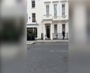 Adam Sandler has been spotted slumped on the pavement outside five-star Claridge&#39;s hotel in Mayfair.&#60;br/&#62;&#60;br/&#62;The A-list actor was seen scrolling his phone on 2 April 2024